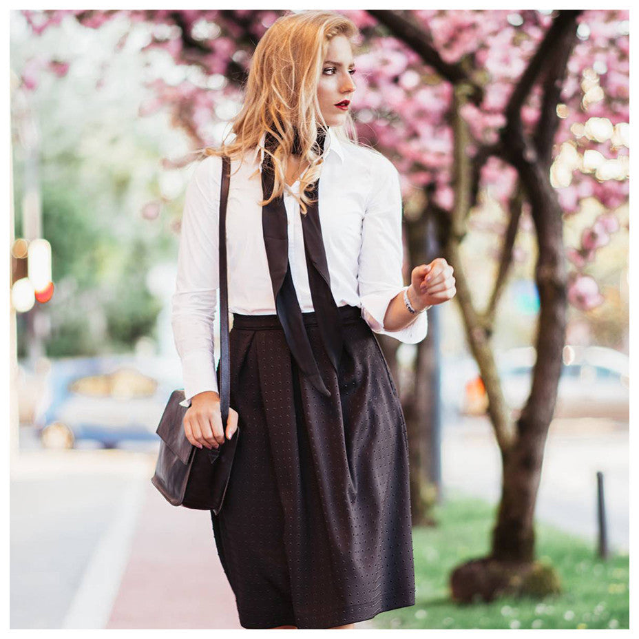 Black skirt and a black bag