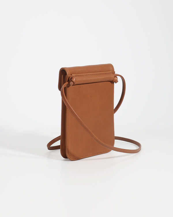 Brown leather crossbody bag on a white background