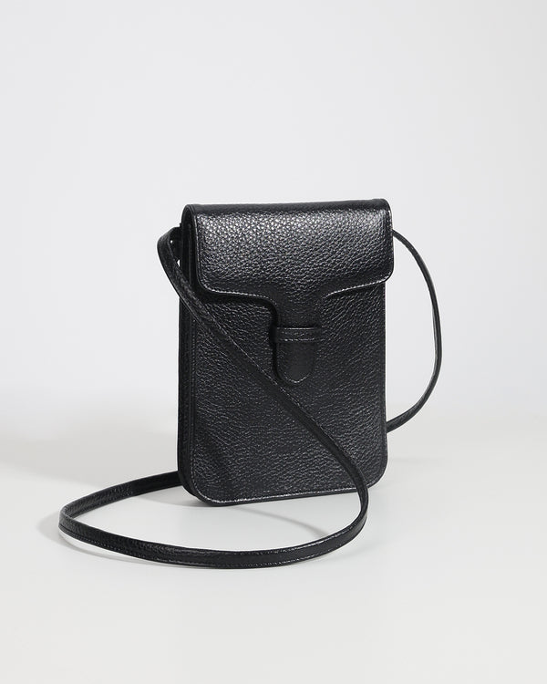 Black leather crossbody bag on a light gray background
