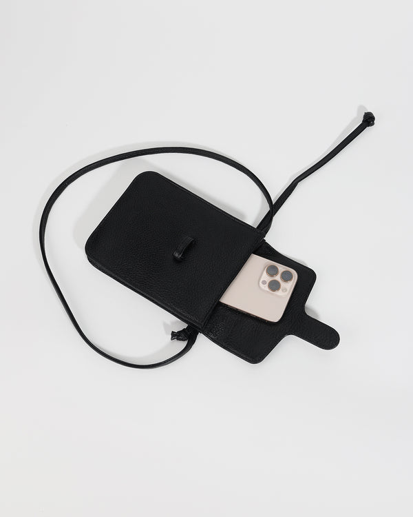 Black phone bag with a strap on a light gray background