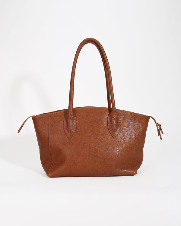 Brown leather handbag on a white background
